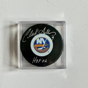 Clark Gillies signed Islanders puck with bold HOF 02 inscription in protective display case.