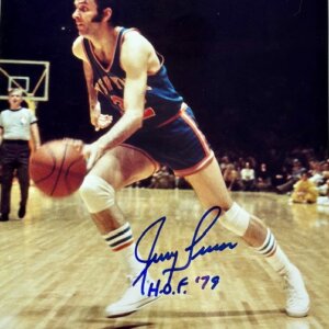 Jerry Lucas dribbling the basketball in a signed Knicks photo with HOF ’79 inscription and Famous Inc. COA.