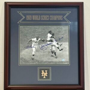 Signed 1969 Mets final out photo featuring Ed Charles, Jerry Koosman, and Jerry Grote celebrating on the mound, Riccio verified, framed 15.5×17.5.