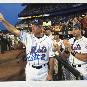 Mike Piazza and Bobby Valentine wearing First Responders caps in a powerful post‑9/11 New York tribute moment