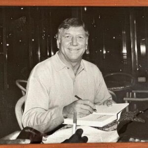 Mickey Mantle signing autographs for fans during his retirement years as a New York Yankees legend