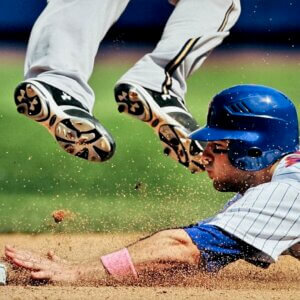 David Wright photo sliding safely into third base with dirt flying