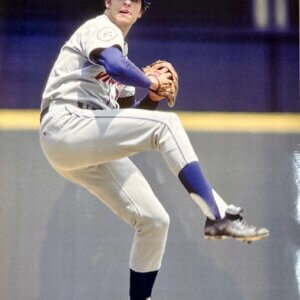 Jon Matlack pitching on the mound in his New York Mets uniform during a classic game moment.