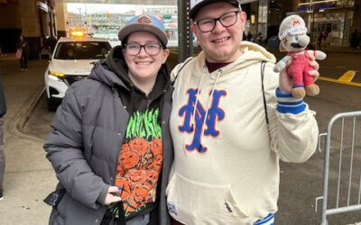 Mets Fans Showing Team Pride in Blue and Orange